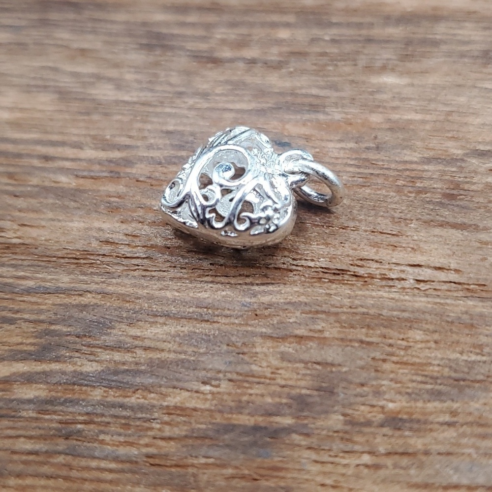 Ornate openwork heart pendant Victorian